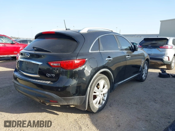 2014 Infiniti QX70 with VIN JN8CS1MU5EM450712, listed as a IAAI auction lot 41734354 with 164,349 mi miles and . Bid and sale history available at DreamBid. Image 4.