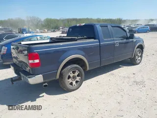 2005 Ford F-150 XLT with VIN 1FTPX14585NB29863, listed as a IAAI auction lot 42117501 with 305,480 mi miles. Bid and sale history available at carsss.com. Image 4.