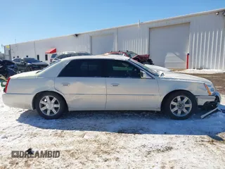 2006 Cadillac DTS 1SC z VIN 1G6KD57Y86U102513, wystawiony jako IAAI lot #41607409 z przebiegiem 102 438 mil mil oraz . Historia ofert i sprzedaży dostępna na DreamBid. Obrazek 13.