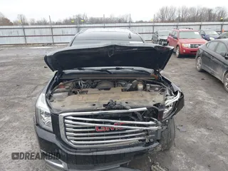 2016 GMC Yukon SLT with VIN 1GKS1BKC9GR480199, listed as a IAAI auction lot 41352032 with 146,716 mi miles. Bid and sale history available at carsss.com. Image 10.