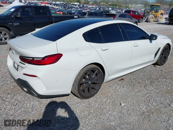 2022 BMW 8 Series M850i with VIN WBAGV8C09NCH15245, listed as a IAAI auction lot 42053154 with 26,384 mi miles and . Bid and sale history available at DreamBid. Image 4.