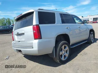 2016 Chevrolet Tahoe LTZ with VIN 1GNSKCKC1GR452600, listed as a IAAI auction lot 42305719 with 121,041 mi miles and . Bid and sale history available at DreamBid. Image 4.