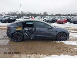 2023 Tesla Model 3 Performance with VIN 5YJ3E1EC6PF590739, listed as a IAAI auction lot 40919165 with 20,474 mi miles. Bid and sale history available at carsss.com. Image 14.