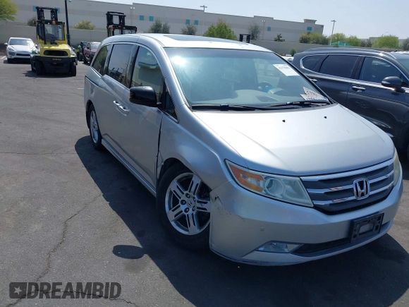 2012 Honda Odyssey Touring с VIN 5FNRL5H91CB004546, выставлен на аукционе IAAI как лот 42175002 с пробегом 118 719 миль миль и . История ставок и продаж доступна на DreamBid. Изображение 1.