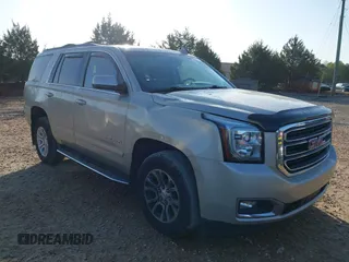 2016 GMC Yukon SLT z VIN 1GKS2BKC1GR289437, wystawiony jako IAAI lot #41883621 z przebiegiem 88 296 mil mil oraz . Historia ofert i sprzedaży dostępna na DreamBid. Obrazek 1.