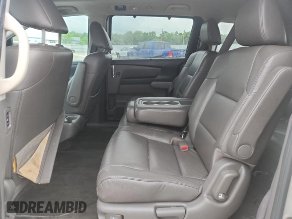2014 Honda Odyssey Touring with VIN 5FNRL5H95EB083772, listed as a Copart auction lot 56713525 with 215,833 mi miles and Salvage title. Bid and sale history available at DreamBid. Image 11.