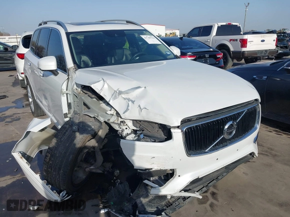 2016 Volvo XC90 Momentum with VIN YV4102XK4G1059299, listed as a IAAI auction lot 41749794 with 76,439 mi miles and . Bid and sale history available at DreamBid. Image 1.