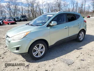 2011 Hyundai Tucson Limited with VIN KM8JUCAC3BU185753, listed as a Copart auction lot 50196115 with 142,880 mi miles and Salvage Title. Bid and sale history available at DreamBid. Image 1.