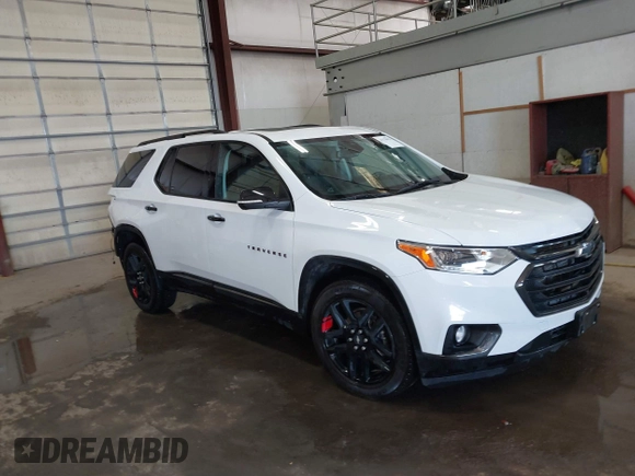 2021 Chevrolet Traverse Premier with VIN 1GNEVKKW0MJ266937, listed as a IAAI auction lot 41378033 with 34,683 mi miles. Bid and sale history available at carsss.com. Image 1.
