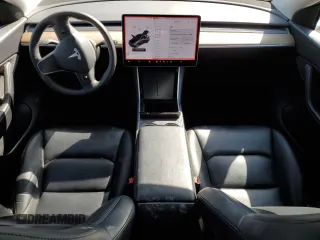 2020 Tesla Model Y Long Range with VIN 5YJYGDEEXLF017789, listed as a Copart auction lot 52705185 with 49,470 mi miles and Salvage Title. Bid and sale history available at DreamBid. Image 8.