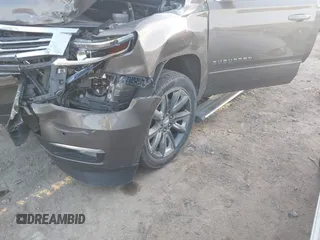 2015 Chevrolet Suburban LTZ with VIN 1GNSKKKC1FR628182, listed as a IAAI auction lot 41801391 with Not Provided miles and . Bid and sale history available at DreamBid. Image 2.