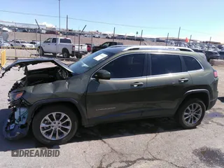 2019 Jeep Cherokee Latitude Plus with VIN 1C4PJLLX7KD129077, listed as a IAAI auction lot 39021322 with 69,503 mi miles. Bid and sale history available at carsss.com. Image 15.