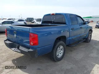 2006 Dodge Dakota SLT with VIN 1D7HE48K96S556831, listed as a IAAI auction lot 41681544 with 236,486 mi miles. Bid and sale history available at carsss.com. Image 4.