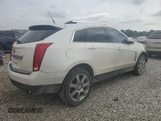 2012 Cadillac SRX Performance Collection z VIN 3GYFNBE32CS615988, wystawiony jako Copart lot #61198415 z przebiegiem 156 135 mil mil oraz Szkoda całkowita • Salvage title. Historia ofert i sprzedaży dostępna na DreamBid. Obrazek 3.