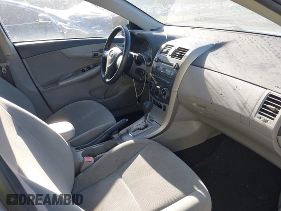 2011 Toyota Corolla L with VIN 2T1BU4EE9BC713402, listed as a IAAI auction lot 42044806 with 121,894 mi miles. Bid and sale history available at carsss.com. Image 5.