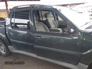 2003 Ford Explorer Sport Trac XLS z VIN 1FMZU77E73UB07352, wystawiony jako IAAI lot #41803900 z przebiegiem 153 433 mil mil oraz . Historia ofert i sprzedaży dostępna na DreamBid. Obrazek 12.