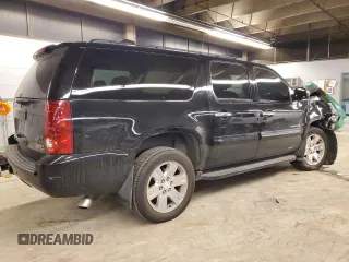 2007 GMC Yukon XL SLT z VIN 1GKFK16377J349144, wystawiony jako Copart lot #84300374 z przebiegiem Nie podano mil oraz Szkoda całkowita • Salvage title. Historia ofert i sprzedaży dostępna na DreamBid. Obrazek 3.