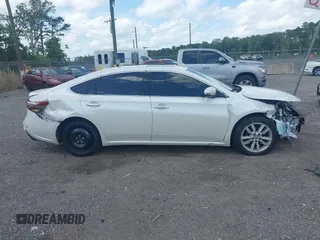 2015 Toyota Avalon Limited with VIN 4T1BK1EB3FU174984, listed as a IAAI auction lot 42155795 with 83,963 mi miles and . Bid and sale history available at DreamBid. Image 13.