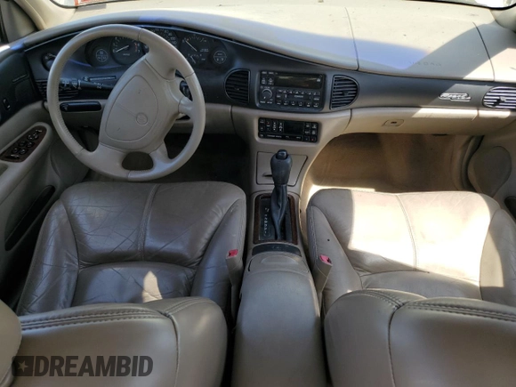 2002 Buick Regal LS z VIN 2G4WB55K421101234, wystawiony jako Copart lot #54744355 z przebiegiem Nie podano mil oraz Szkoda całkowita • Salvage title. Historia ofert i sprzedaży dostępna na DreamBid. Obrazek 8.