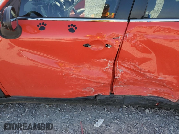 2012 MINI Countryman S with VIN WMWZC3C50CWL82827, listed as a Copart auction lot 57154755 with 149,751 mi miles and Salvage title. Bid and sale history available at DreamBid. Image 7.