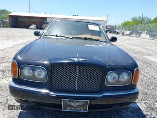 1999 Bentley Arnage z VIN SCBLB51E1XCX01401, wystawiony jako IAAI lot #42133144 z przebiegiem 29 699 mil mil oraz . Historia ofert i sprzedaży dostępna na DreamBid. Obrazek 12.
