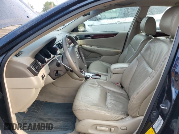 2002 Lexus ES 300 z VIN JTHBF30G820053732, wystawiony jako Copart lot #60042075 z przebiegiem 252 522 mil mil oraz Czysty tytuł • Clean title. Historia ofert i sprzedaży dostępna na DreamBid. Obrazek 7.