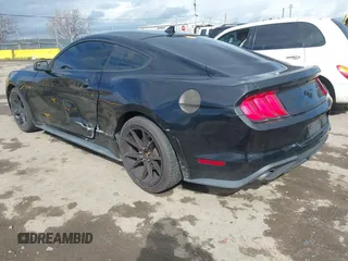 2020 Ford Mustang EcoBoost with VIN 1FA6P8THXL5177271, listed as a IAAI auction lot 41816058 with 87,226 mi miles and . Bid and sale history available at DreamBid. Image 3.