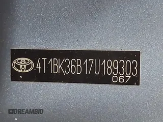 2007 Toyota Avalon XL z VIN 4T1BK36B17U189303, wystawiony jako IAAI lot #41614917 z przebiegiem 238 114 mil mil oraz . Historia ofert i sprzedaży dostępna na DreamBid. Obrazek 17.