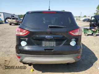 2016 Ford Escape SE with VIN 1FMCU9G93GUA77437, listed as a Copart auction lot 51807905 with 128,261 mi miles and Salvage Title. Bid and sale history available at DreamBid. Image 6.