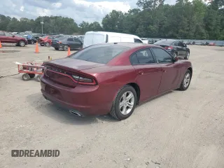 2019 Dodge Charger SXT with VIN 2C3CDXBG4KH721185, listed as a Copart auction lot 57872325 with 123,429 mi miles and Salvage title. Bid and sale history available at DreamBid. Image 3.