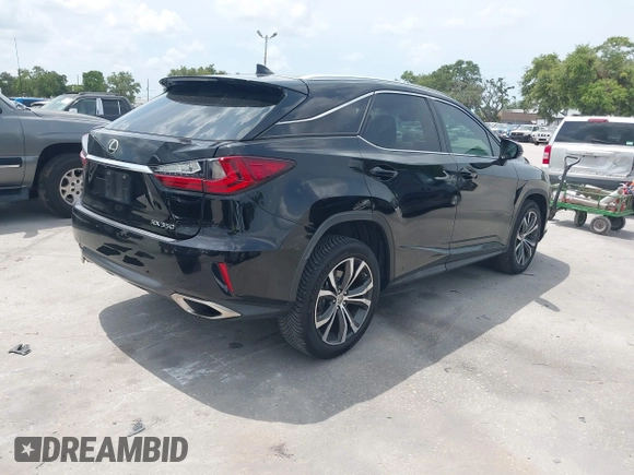 2016 Lexus RX 350 with VIN 2T2ZZMCA6GC023710, listed as a IAAI auction lot 42201278 with 126,873 mi miles and . Bid and sale history available at DreamBid. Image 4.