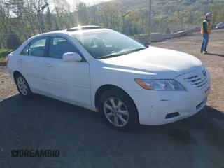 2009 Toyota Camry with VIN 4T1BE46K49U813806, listed as a IAAI auction lot 42141396 with 165,619 mi miles. Bid and sale history available at carsss.com. Image 1.