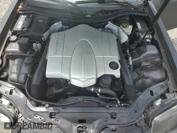 2004 Chrysler Crossfire z VIN 1C3AN69L84X014803, wystawiony jako Copart lot #56139015 z przebiegiem 102 523 mil mil oraz Szkoda całkowita • Salvage title. Historia ofert i sprzedaży dostępna na DreamBid. Obrazek 11.