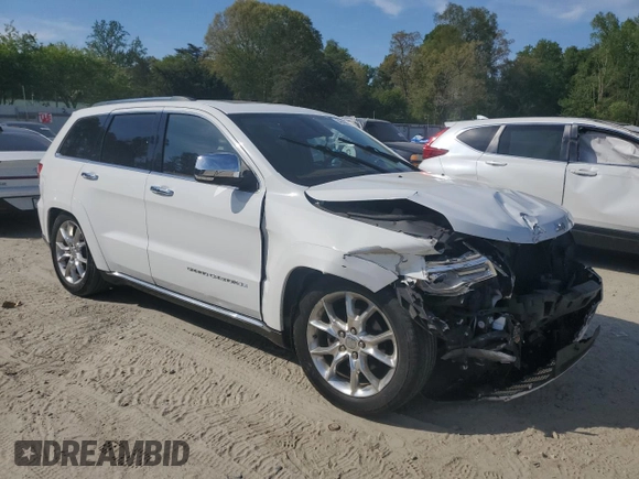 2015 Jeep Grand Cherokee Summit with VIN 1C4RJFJG3FC847797, listed as a Copart auction lot 54848085 with 53,506 mi miles and Salvage Title. Bid and sale history available at DreamBid. Image 4.
