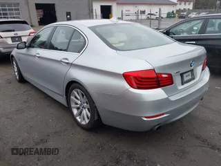 2014 BMW 5 Series 535i xDrive with VIN WBA5B3C57ED539169, listed as a IAAI auction lot 41892006 with 131,303 mi miles and . Bid and sale history available at carsss.com. Image 3.