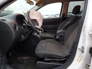 2011 Jeep Compass Latitude with VIN 1J4NT1FB7BD137695, listed as a Copart auction lot 88234495 with 187,059 mi miles and Salvage Title. Bid and sale history available at carsss.com. Image 7.