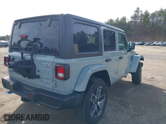2024 Jeep Wrangler Sport S with VIN 1C4RJXN65RW166079, listed as a IAAI auction lot 41795439 with 14,937 mi miles and . Bid and sale history available at DreamBid. Image 4.