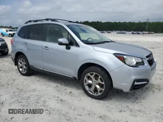 2017 Subaru Forester Touring with VIN JF2SJAWC6HH556728, listed as a Copart auction lot 54914055 with 112,686 mi miles and Salvage title. Bid and sale history available at DreamBid. Image 4.