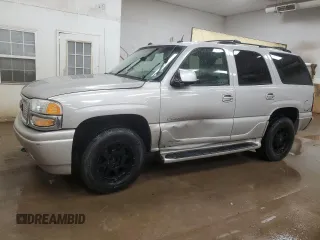 2005 GMC Yukon Denali z VIN 1GKEK63U45J222600, wystawiony jako Copart lot #51329775 z przebiegiem 287 293 mil mil oraz Czysty tytuł • Clean title. Historia ofert i sprzedaży dostępna na DreamBid. Obrazek 1.