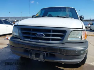 2000 Ford F-150 with VIN 1FTZF1728YKA54035, listed as a IAAI auction lot 42236191 with Not provided miles and . Bid and sale history available at DreamBid. Image 12.