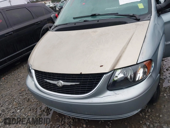 2003 Chrysler Town & Country LX with VIN 2C4GP44L53R209654, listed as a IAAI auction lot 41305673 with 258,070 mi miles and . Bid and sale history available at DreamBid. Image 6.