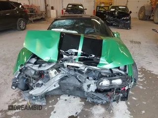 2000 Chevrolet Camaro Z28 z VIN 2G1FP22G0Y2103689, wystawiony jako IAAI lot #42173195 z przebiegiem Nie podano mil oraz . Historia ofert i sprzedaży dostępna na DreamBid. Obrazek 6.