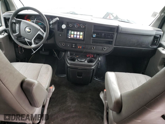 2012 Chevrolet Express Passenger 1LT with VIN 1GAZGYFG3C1118315, listed as a Copart auction lot 80870104 with 122,178 mi miles and Salvage title. Bid and sale history available at DreamBid. Image 8.