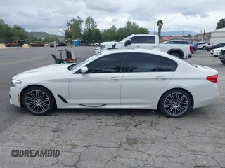 2018 BMW 5 Series 530i z VIN WBAJA5C54JG898565, wystawiony jako IAAI lot #41745230 z przebiegiem 123 776 mil mil oraz . Historia ofert i sprzedaży dostępna na DreamBid. Obrazek 14.