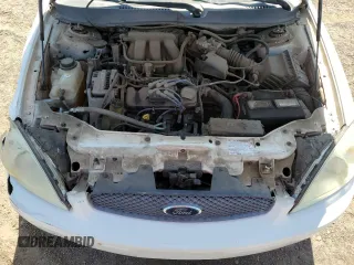 2006 Ford Taurus SE with VIN 1FAFP53UX6A194398, listed as a Copart auction lot 59582515 with 114,933 mi miles and Salvage title. Bid and sale history available at DreamBid. Image 11.