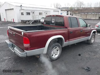 2002 Dodge Dakota SLT with VIN 1B7HL48N62S694380, listed as a IAAI auction lot 42008125 with 152,421 mi miles. Bid and sale history available at carsss.com. Image 4.