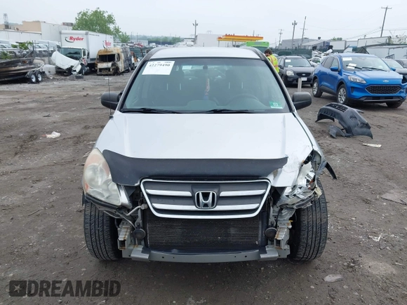 2006 Honda CR-V LX z VIN JHLRD785X6C006967, wystawiony jako IAAI lot #42279490 z przebiegiem 250 750 mil mil oraz . Historia ofert i sprzedaży dostępna na DreamBid. Obrazek 13.