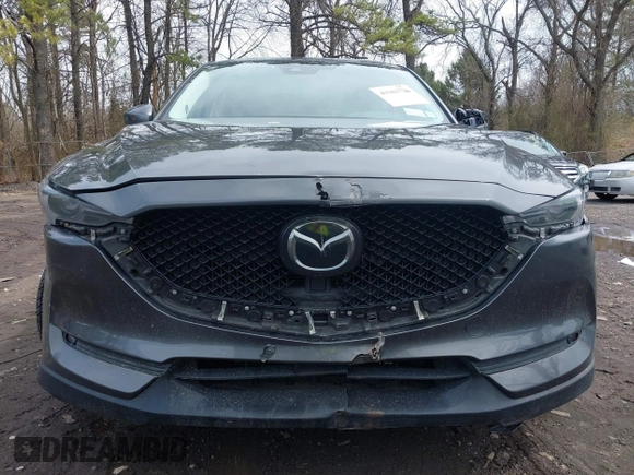 2018 Mazda CX-5 Grand Touring with VIN JM3KFBDM6J0388540, listed as a IAAI auction lot 41963726 with 103,148 mi miles. Bid and sale history available at carsss.com. Image 12.