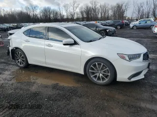 2019 Acura TLX with VIN 19UUB2F31KA001469, listed as a Copart auction lot 82818834 with 64,498 mi miles and Salvage Title. Bid and sale history available at carsss.com. Image 4.