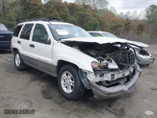 2003 Jeep Grand Cherokee Laredo with VIN 1J4GW48S33C521253, listed as a IAAI auction lot 41929756 with 209,686 mi miles. Bid and sale history available at carsss.com. Image 1.